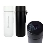 A drink bottle featuring a sleek design in white and black, with a logo and a spout for easy sipping.
