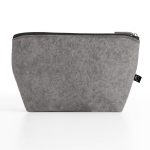 A grey cosmetic pack made of felt material with a zip closure and a small logo on the side.