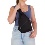 A black Wallaby neck pouch is being worn across the body, featuring a front zip pocket.