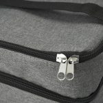 A grey cooler bag with a double zipper and black accents, featuring a sturdy handle.