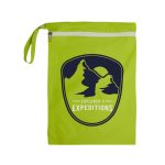 A bright green bag featuring a logo with mountains and the text "Explorer's Expeditions" on the front.