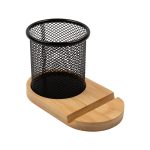 A bamboo pen tidy phone stand features a black mesh holder on a bamboo base, designed for stationery and devices.
