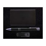 A Quay Gift Set featuring a sleek black pen, a cardholder, and a USB flash drive, all presented on a black background.
