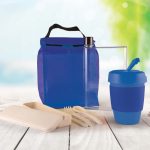 A blue picnic pack containing a drink bottle, reusable cup, cutlery, and food containers.
