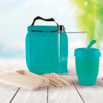 A turquoise picnic pack containing a drink bottle, reusable cup, cutlery, and meal containers.