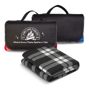 A black and grey checkered picnic blanket, folded with handles and a logo, in a compact form.