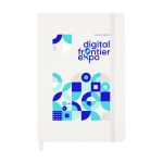 A white notebook featuring geometric patterns in blue and light blue, with a logo on the cover.