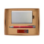A sleek metallic cardholder, a red pen, and a red USB flash drive are neatly arranged in a craft cardboard gift box.