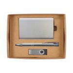 A gift set featuring a silver card holder, a silver pen, and a silver USB drive, all presented in a cardboard box.