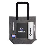 A grey tote bag containing a pen, notepad, drink bottle, and a pack of colourful treats, featuring a logo.