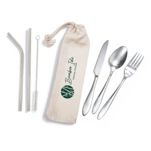 A stainless steel cutlery and straw set in a calico pouch, featuring a knife, fork, spoon, and two straws.