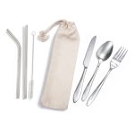 A stainless steel cutlery set including a knife, fork, spoon, and two straws in a calico pouch.