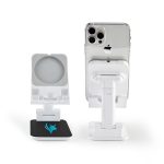 A white phone stand with a circular holder and a square base featuring a logo, supporting a smartphone.
