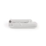 A white Vectra Phone Stand with a compact, foldable design, featuring a simple structure and a round opening.