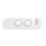 A white phone stand featuring two circular depressions and a slot for a device.