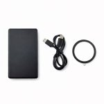 A black solid state power bank, a USB-C cable, and a circular accessory. The product features a logo.