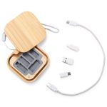 A bamboo case containing three charging cables in grey, with USB and micro USB connectors.