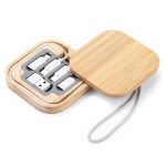 A Reveal Square Cable Set in a bamboo case, featuring multiple charging cables neatly stored inside.