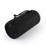 A black cylindrical Bluetooth speaker with a textured surface and control buttons on the side.