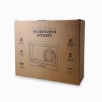 A cardboard box containing a transparent speaker with RGB LED lighting. It features icons for Bluetooth and power.