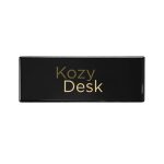 A sleek black desk with a gold logo featuring the text "Kozy Desk."