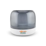 A compact grey and white speaker featuring a rounded design and a logo on the front.