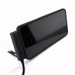 A charging cable in black, featuring a sleek design with a connector and a stand for easy usage.