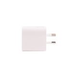 A Paramount Wall Charger designed for travel, featuring a compact white design with US-style prongs.