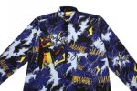 A vibrant blue and black jacket featuring a pattern of yellow lightning bolts and abstract designs. It has a logo on the collar.