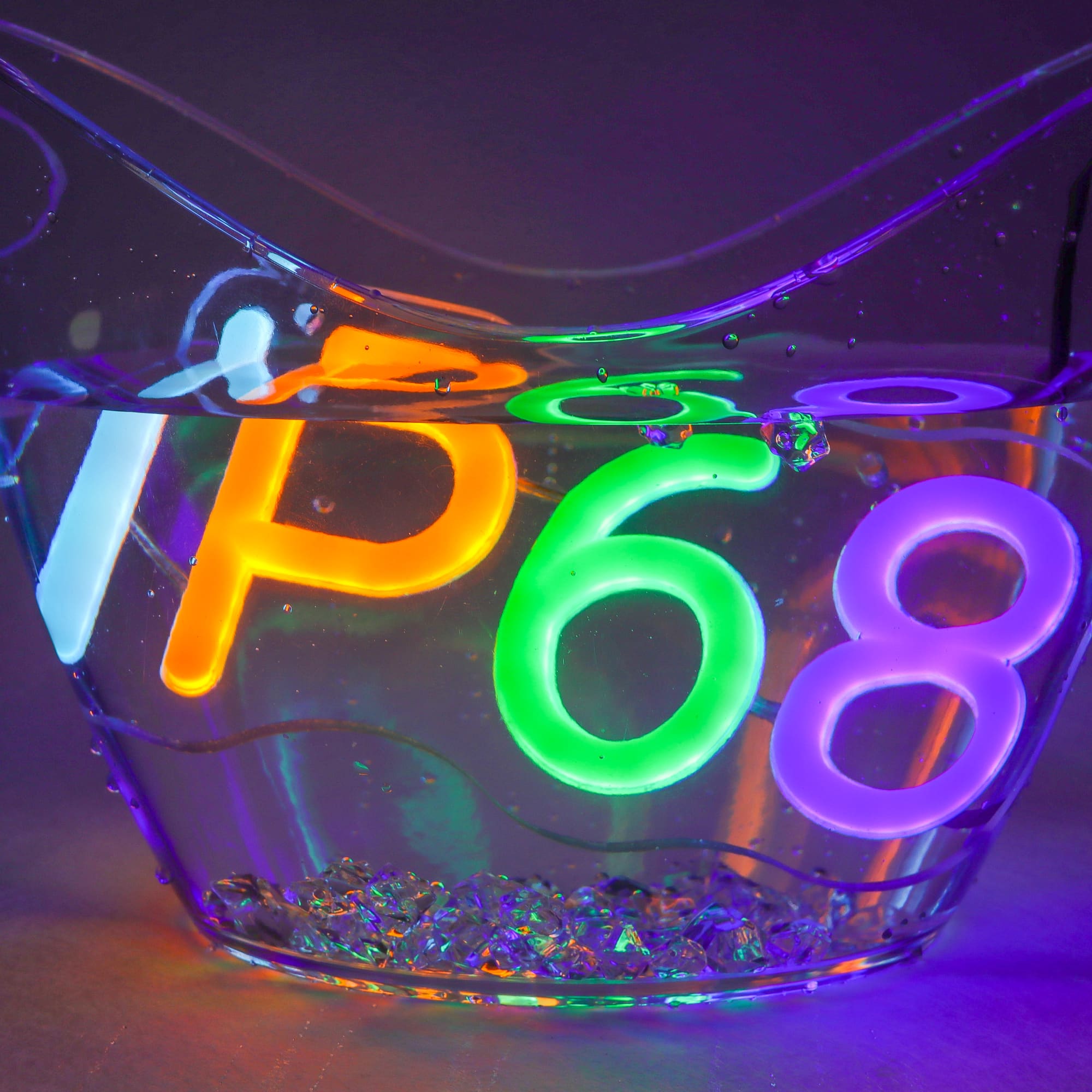 A waterproof IP68 neon LED sign in vibrant colours, partially submerged in water with bubbles. Features a branding logo. Waterproof IP68 Neon LED Sign - Image 1