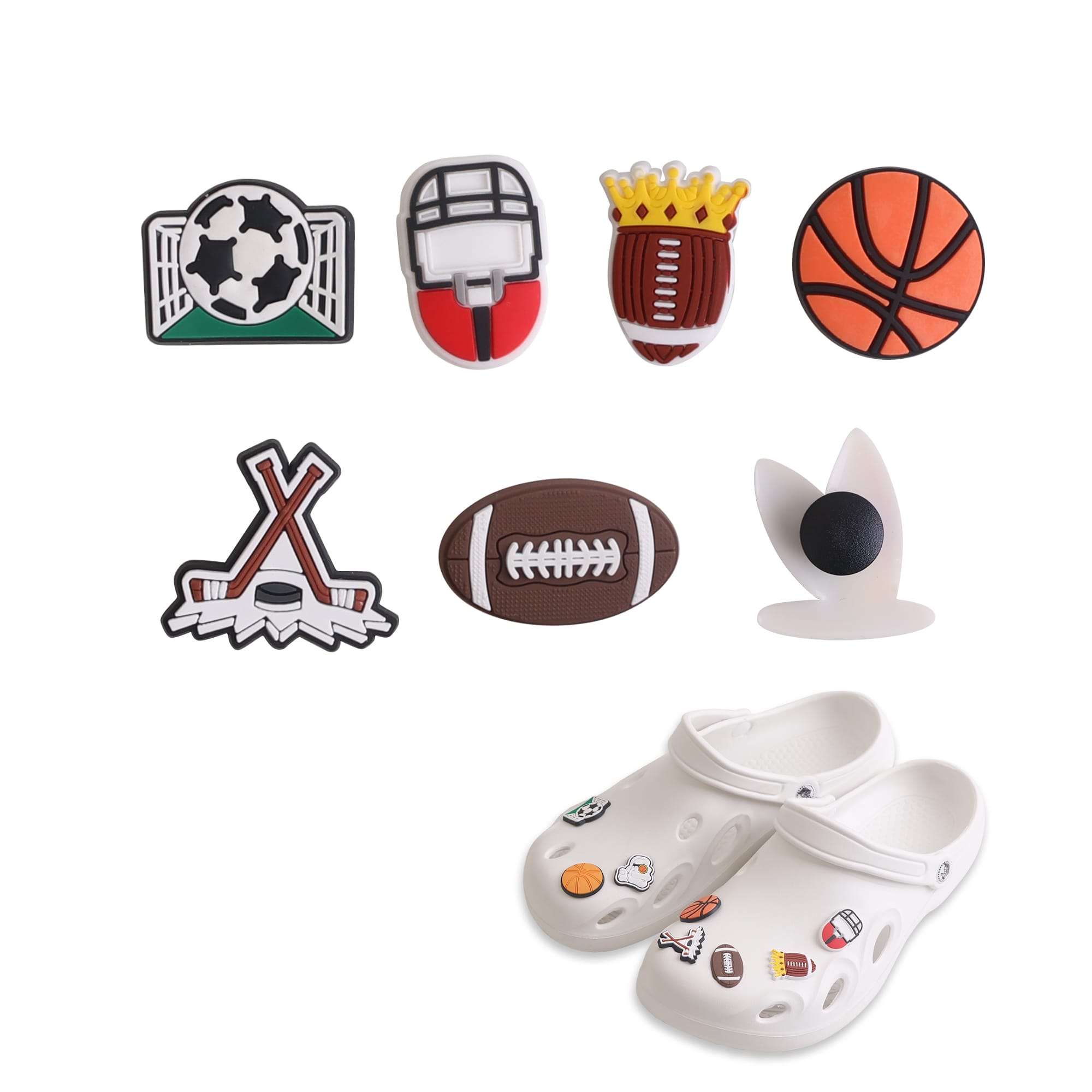 A pair of white Clog shoes with assorted sports-themed charms in green, red, brown, orange and black. Clog Shoe Charms - Image 1