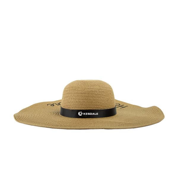 A wide-brim straw hat in beige with a black band and logo, featuring a textured weave design. A wide-brim straw hat in beige with a black band and logo, featuring a textured weave design.