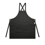 A black apron featuring cross-back straps and a front pocket, with eyelet detailing and branding.