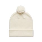 A cream Pom Pom Beanie with a fluffy pom pom on top and a folded cuff, featuring a logo on the side.