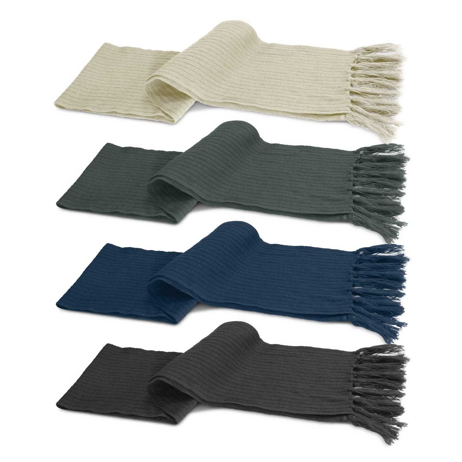 A set of four cable knit scarves in cream, dark green, navy blue, and charcoal, featuring fringe detailing. Nebraska Cable Knit Scarf - Image 1