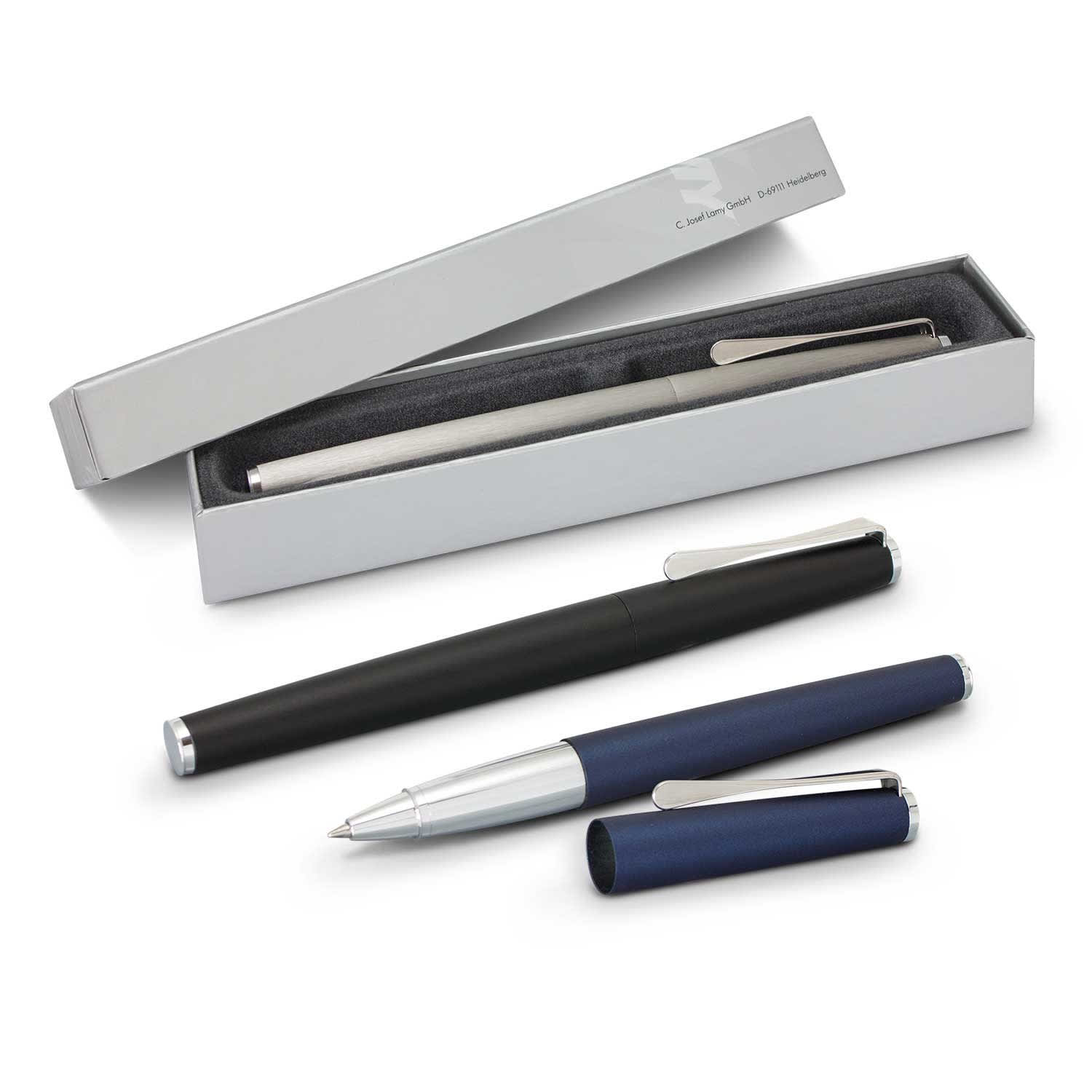 A sleek black and silver Lamy Studio rolling ball pen alongside a blue capped pen, presented in a stylish box. LAMY Studio Rolling Ball Pen - Image 1