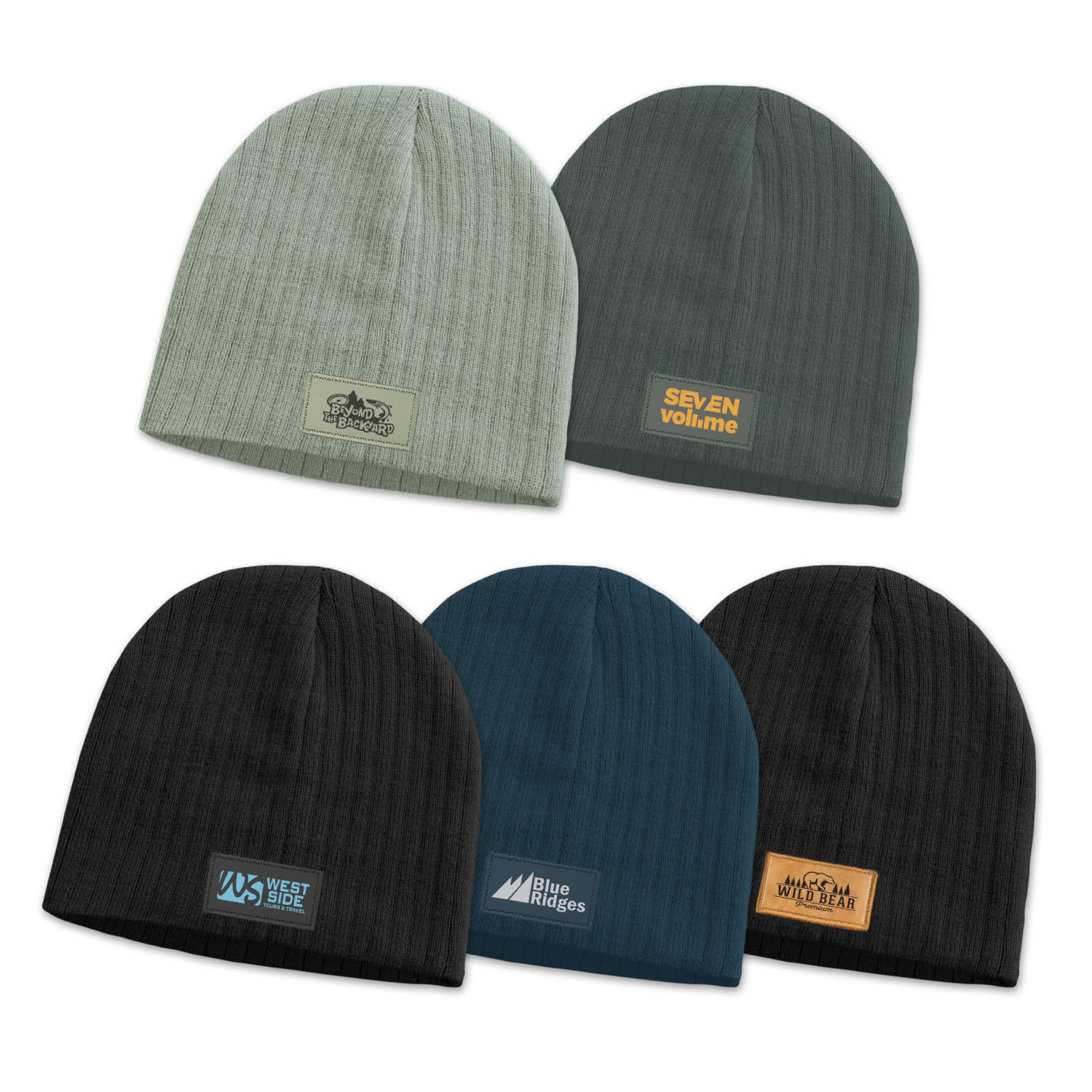 A collection of Nebraska cable knit beanies in green, dark green, teal, and black, featuring various patches. Nebraska Cable Knit Beanie with Patch - Image 1