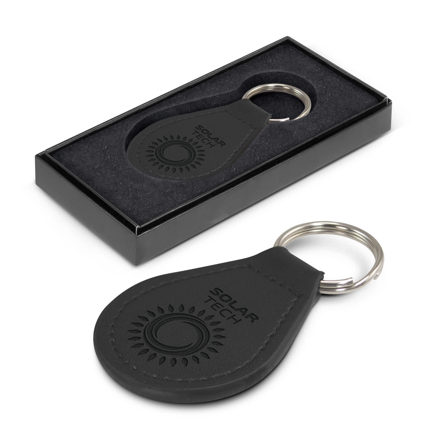 A round black leather key ring with a metal keychain, presented in a sleek black box. Prince Leather Key Ring - Round - Image 1