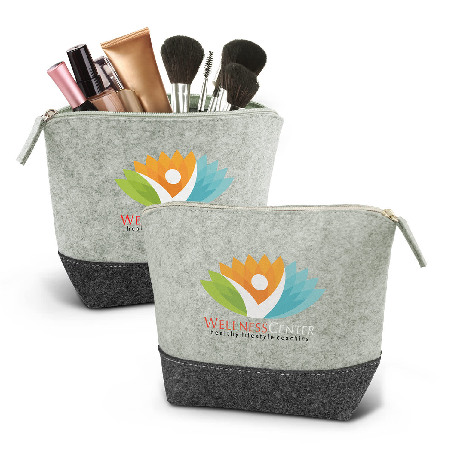 A green and grey cosmetic bag with a logo, filled with makeup items and brushes. Cassini Cosmetic Bag - Image 1