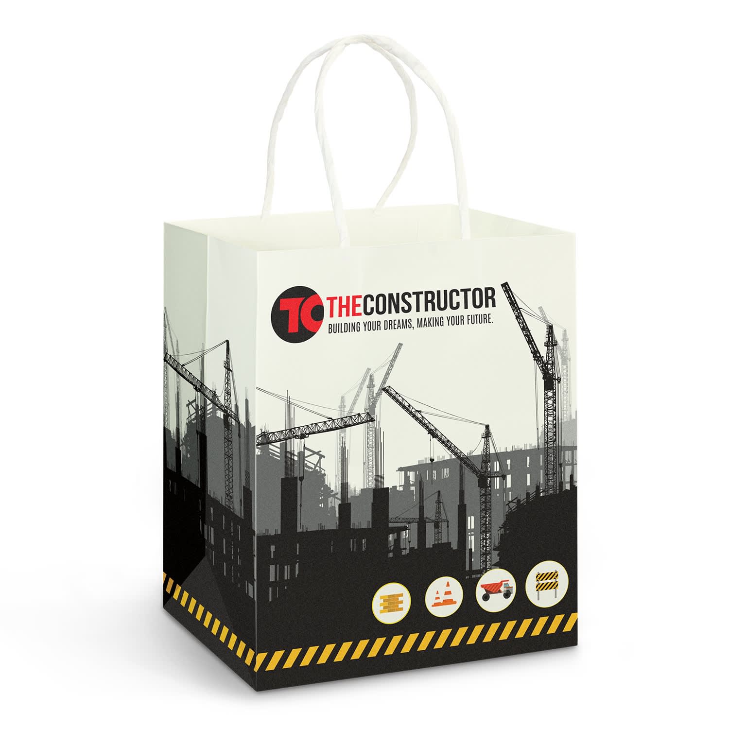 A medium, full-colour paper carry bag with a construction theme, featuring a logo and various illustrated elements. Medium Paper Carry Bag - Full Colour - Image 1