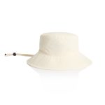 A cream nylon wide brim bucket hat with an adjustable chin strap and a rounded top.