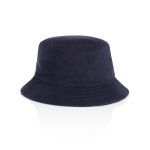 A navy terry bucket hat with a wide brim and soft texture, featuring a logo on the side.