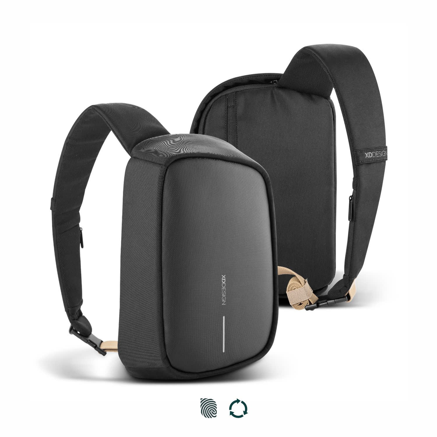 A black sling bag with adjustable straps and a logo, featuring a sleek design and a padded compartment. Bobby Sling - Image 1