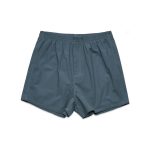 Grey boxer shorts featuring a loose fit and an elasticised waistband, with a small branding logo.