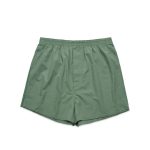 Green boxer shorts with an elastic waistband, featuring a simple design and no visible logos or branding.