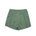 Green boxer shorts featuring an elastic waistband. The shorts have a simple design without any visible logos.