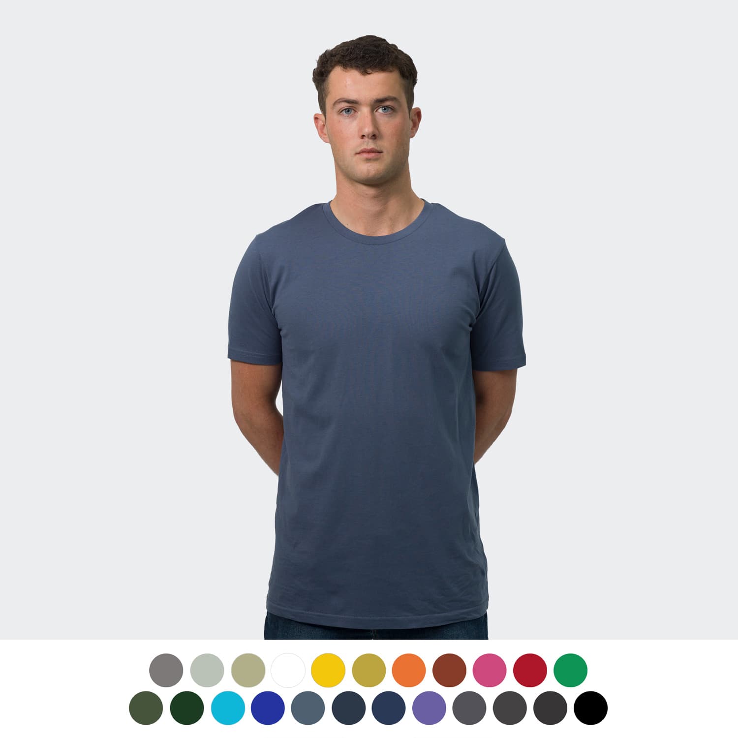 A model wearing a plain blue men's T-shirt, displayed alongside a variety of colour options. TRENDSWEAR Original Mens T-Shirt - Image 1