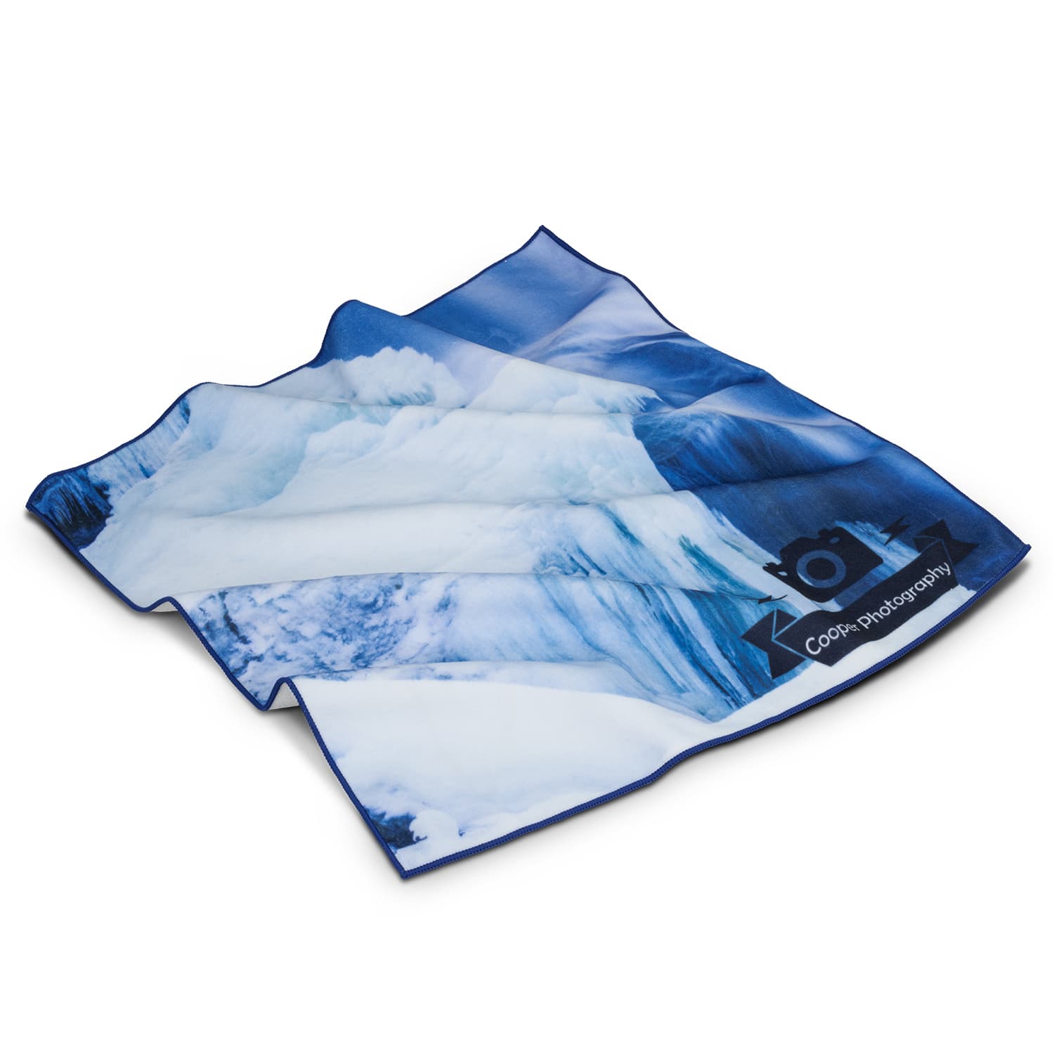 A large magic cover featuring a blue and white ice-themed design, with a logo on one side. Magic Cover - Large - Image 1