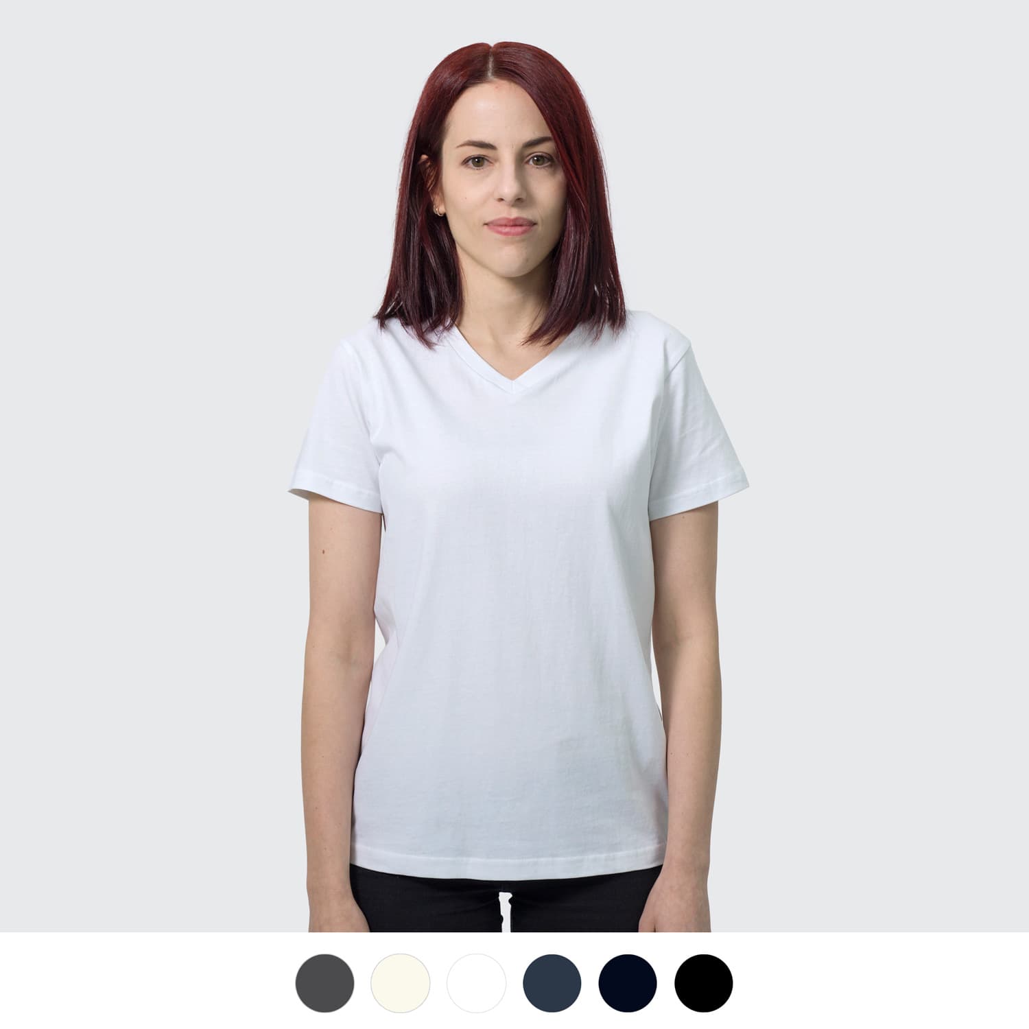 A white women's t-shirt with a v-neck design, featuring a model standing against a light grey background. TRENDSWEAR Viva Women's T-Shirt - Image 1