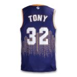A custom men's basketball top in navy blue and yellow, featuring a skyline design and a logo.